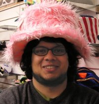 Image of Deepak Saxena in a pink hat - don't ask